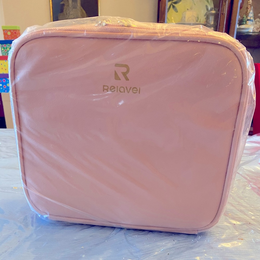 Relavel makeup bag. Small. Pink. New in package.